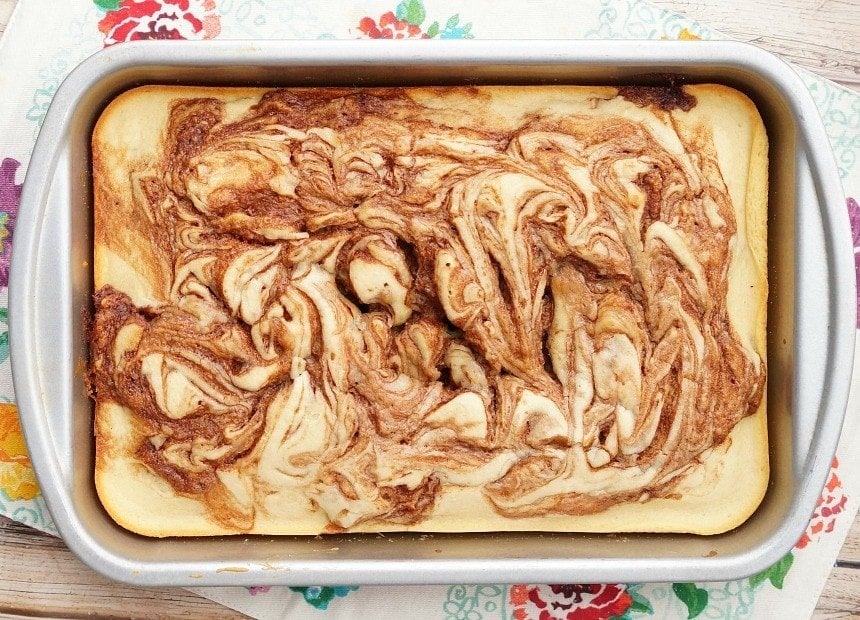 A close up of cinnamon roll cake