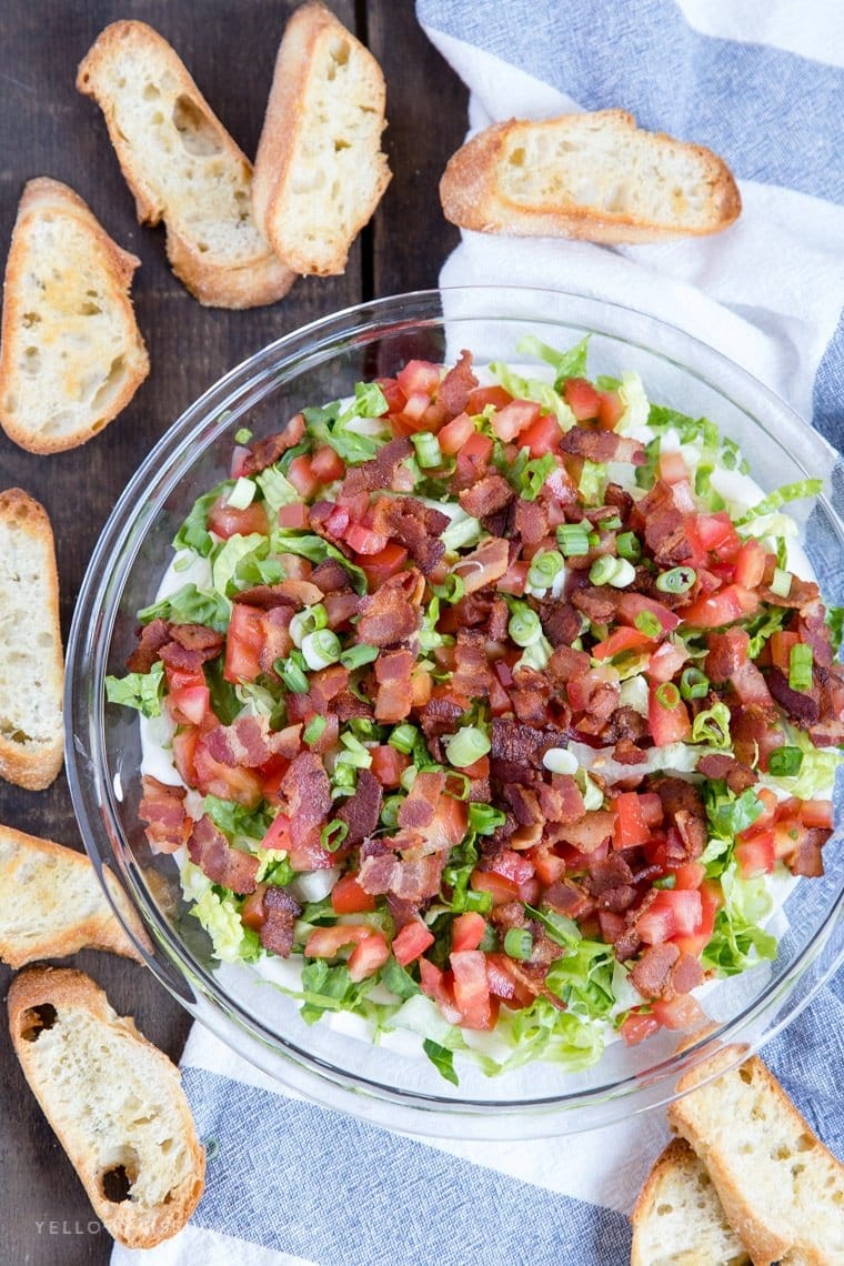 BLT Dip surrounded by crispy crostini for dipping