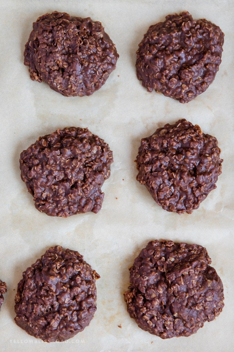 Chocolate No Bake Cookies on a parchment lined cookie sheet