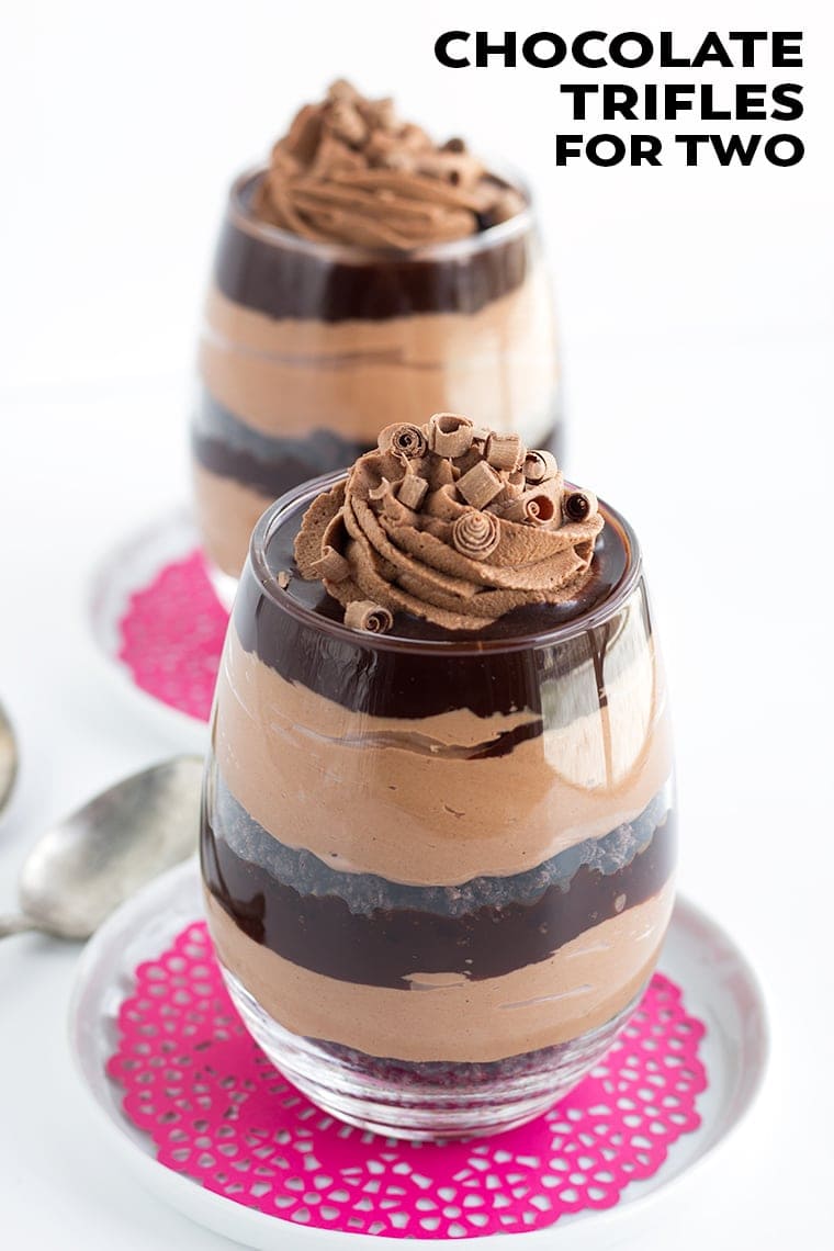 Two chocolate trifles sitting on a table
