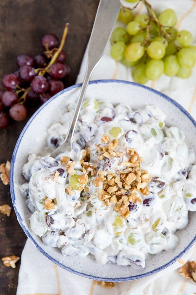 This Creamy Grape Salad with walnuts is is creamy and sweet and the perfect side dish or dessert for picnics, potlucks and parties. 