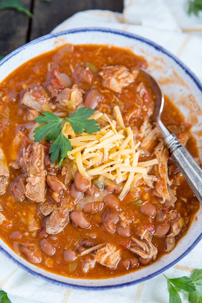 Slow Cooker Pulled Pork Chili in a bowl with a spoon