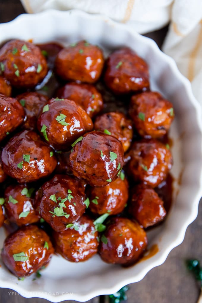 Spicy Barbecue Grape Jelly Meatballs overhead in a white platter