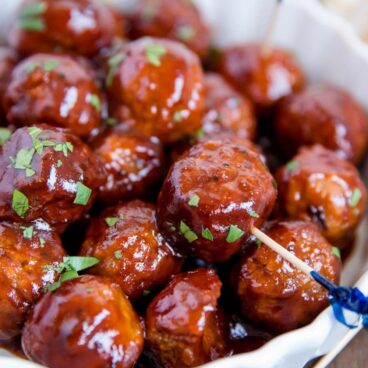 A close up of barbecue meatballs in a bowl