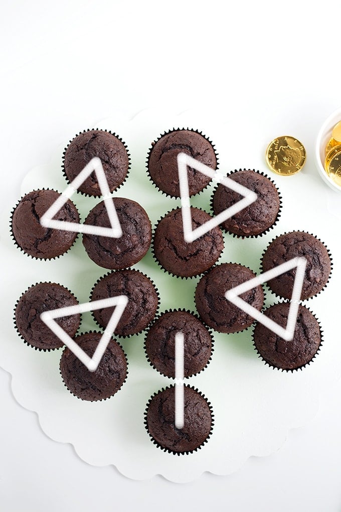 Cupcakes layed out to be frosted for a Shamrock Cupcake Cake