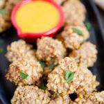 A close up of walnut crusted chicken nuggets