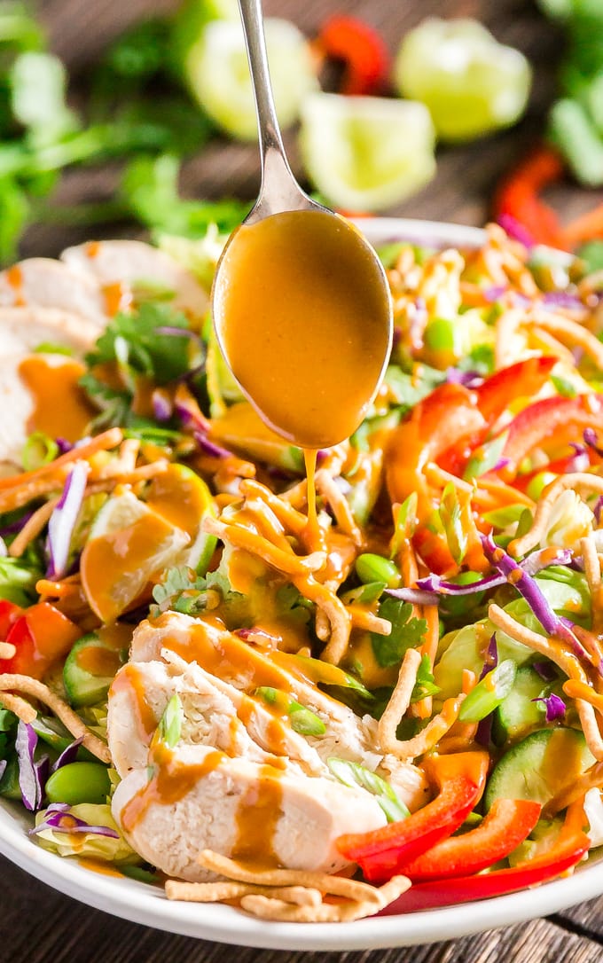 Asian Salad with Peanut Dressing is crisp, refreshing and full of delicious flavors- this is the perfect healthy main dish but can also be made to feel a crowd as a side dish or starter that will have people fighting for seconds!