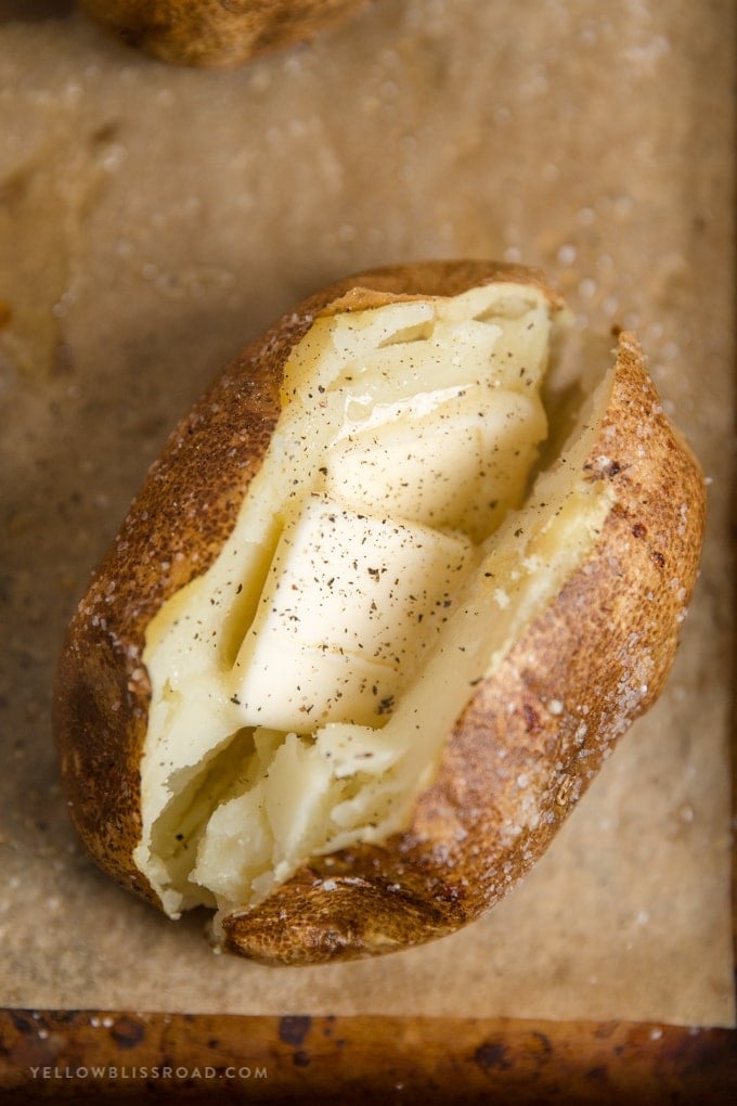 Baked potato with butter and black pepper