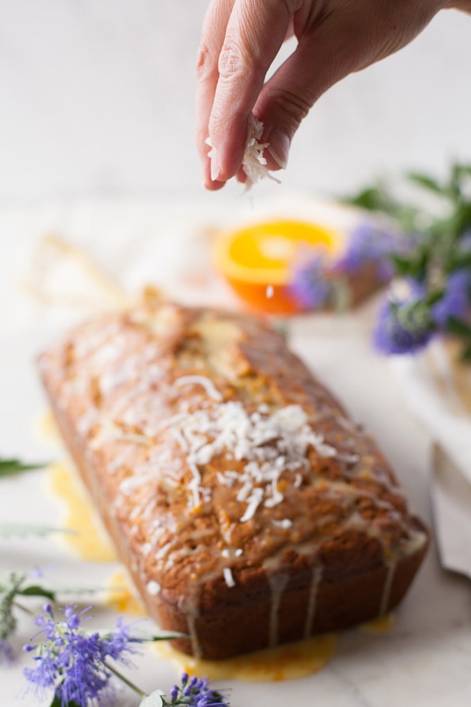 Coconut Banana Bread with Orange Glaze. Sprinkle some coconut for a delicious topping.