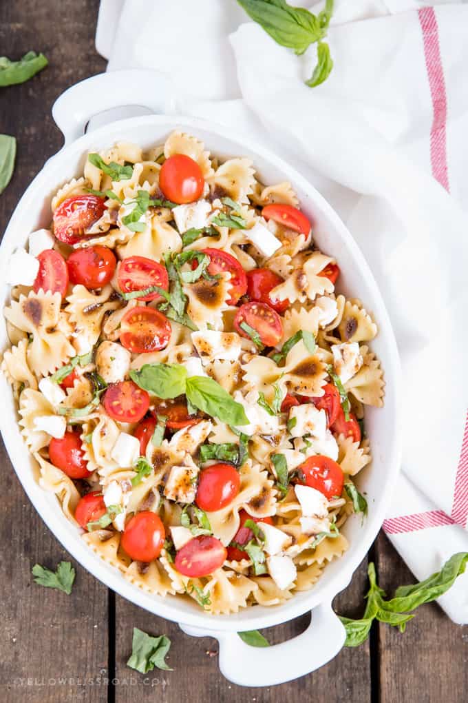 My Caprese Pasta Salad is he perfect spring pasta salad with tender pasta, juicy tomatoes, chunks of fresh Mozzarella and a tangy Balsamic Vinaigrette. 