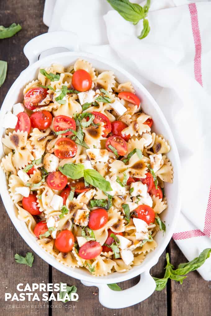 Caprese Pasta Salad photo taken from overhead with title text
