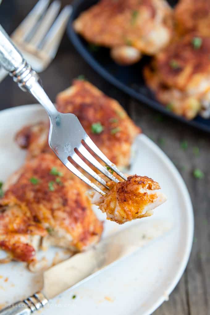 Crispy Baked Chicken Thigh meat on a fork