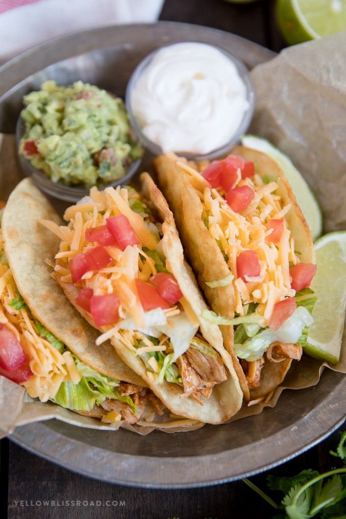 Easy homemade chicken tacos with guacamole and sour cream