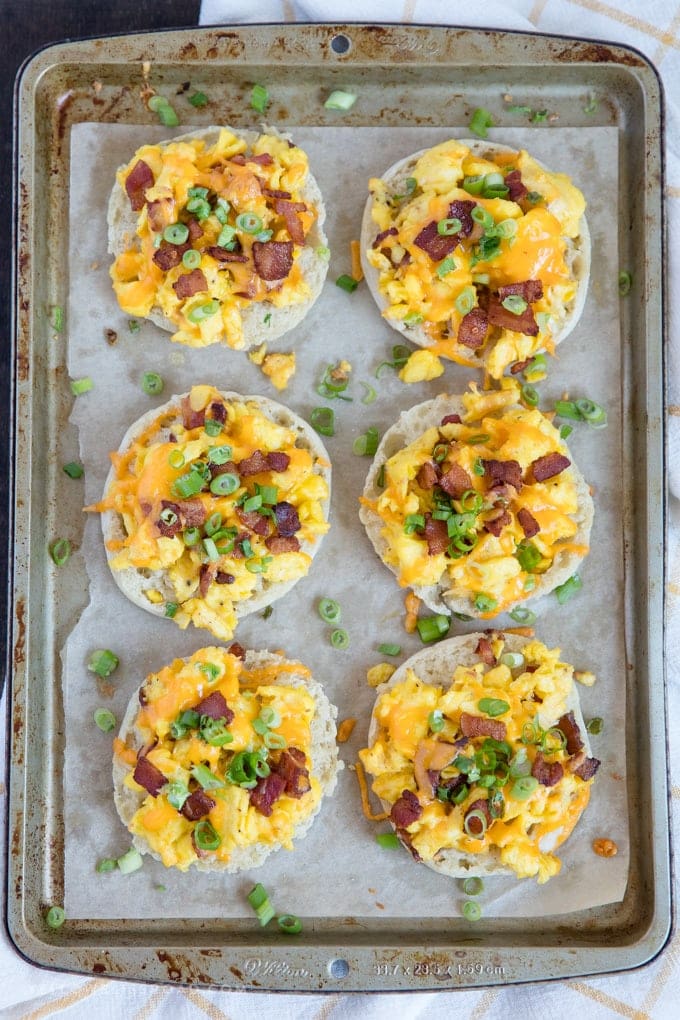 A tray of English muffin breakfast pizzas