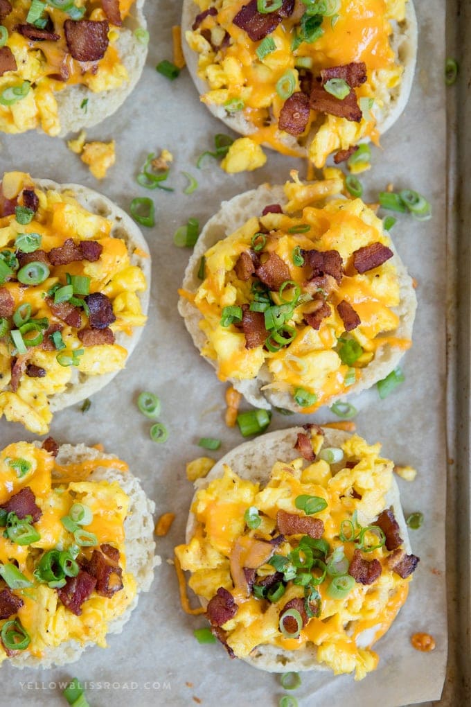 A pan of english muffin breakfast pizzas