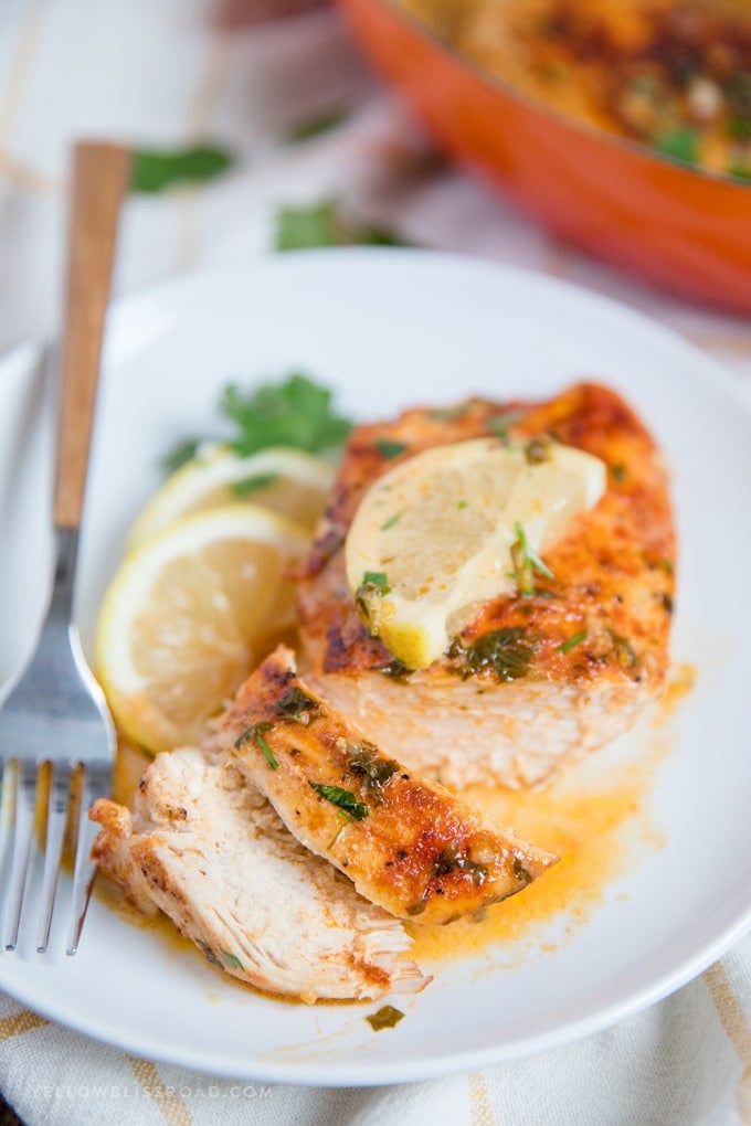 Chicken with Lemon Butter Sauce sliced with a fork