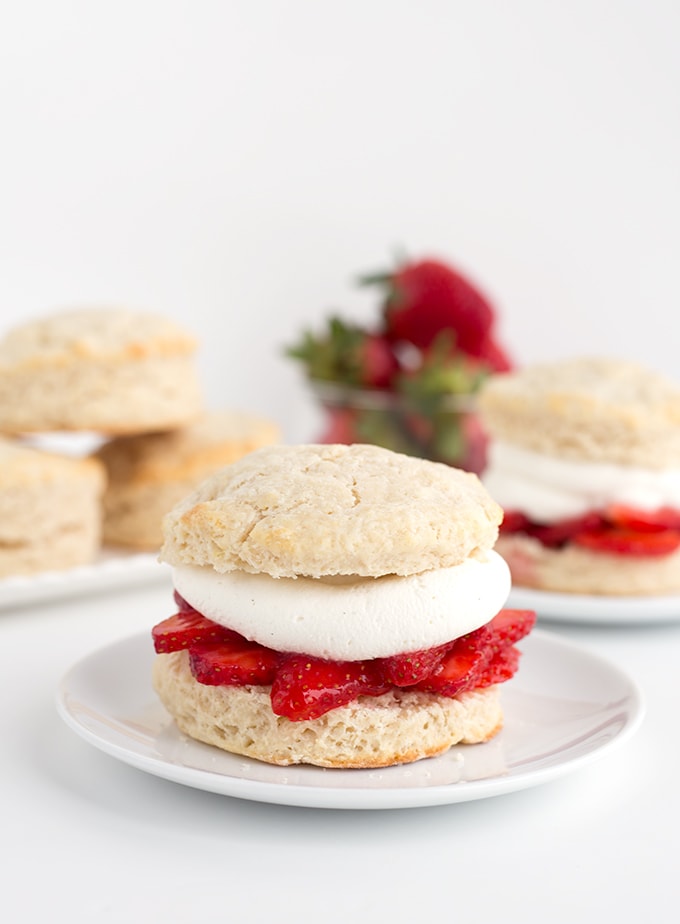 A great strawberry shortcake always starts with the biscuit. These sweetened buttermilk biscuits are so soft and slightly dense. They make the perfect base to soak up the strawberry syrup too! Stack the sliced strawberries high and the homemade vanilla whipped cream even higher! Assembling strawberry shortcakes