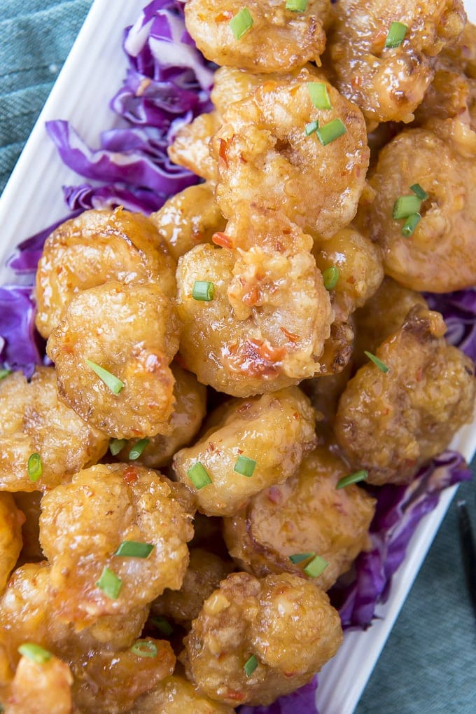 Overhead image of bang bang shrimp on a platter