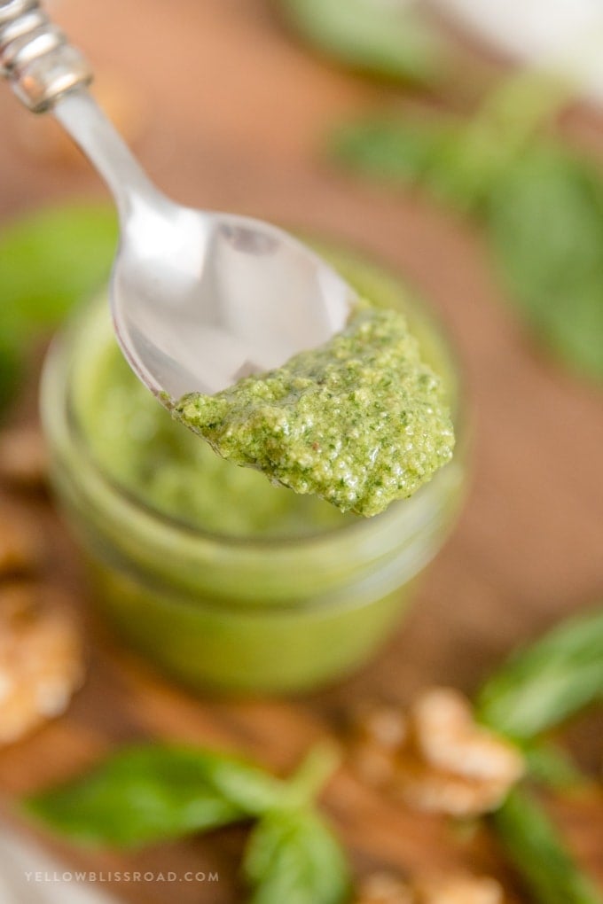 Homemade Walnut Basil Pesto recipe on a spoon