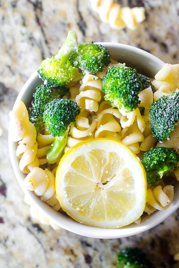A bowl of pasta salad with broccoli
