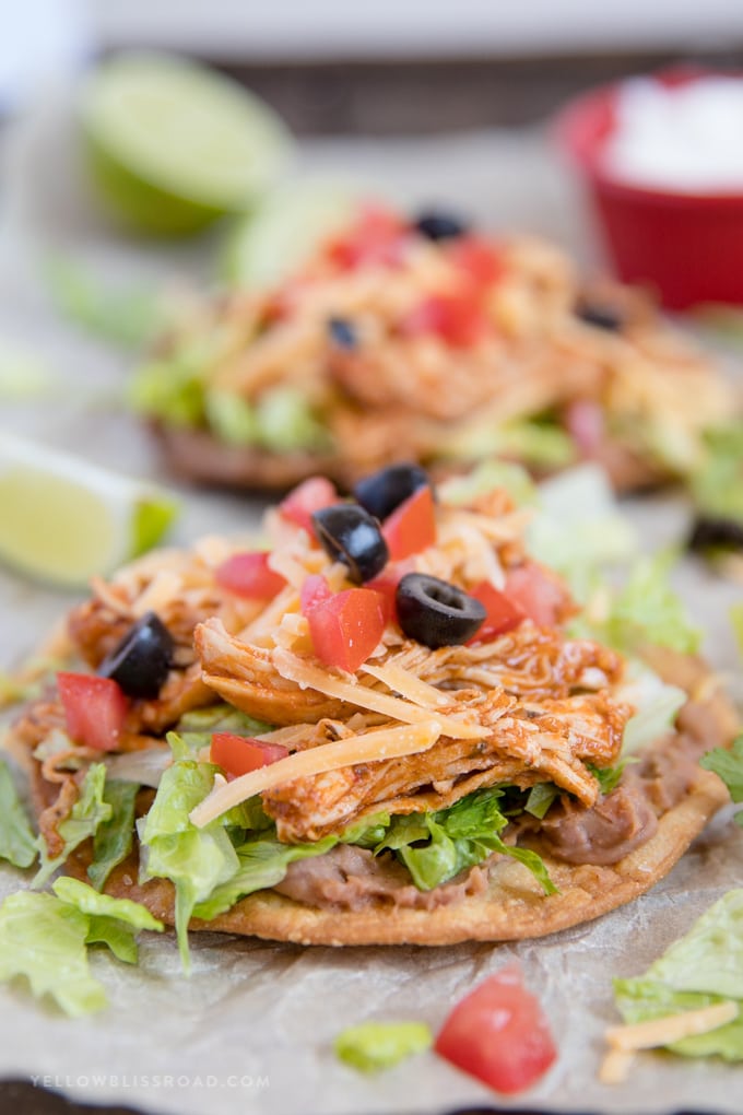 Close up of chicken tostadas with toppings