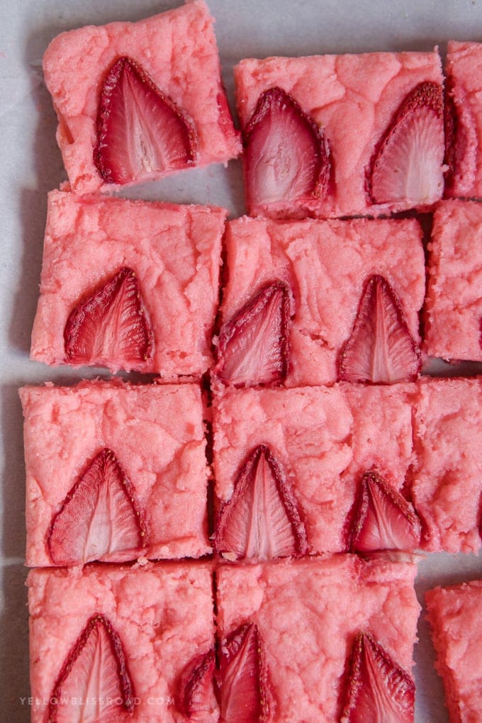 Strawberry Brownies are a super simple springtime dessert that comes together easily with just a few pantry ingredients and some fresh strawberries. Strawberry Brownies with Fresh Strawberries