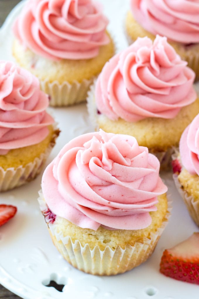 A plate of fresh strawberry cupcakes