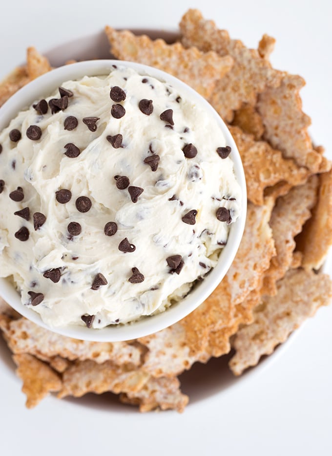 serving platter with cannoli dip and powdered sugar dusted cannoli chips