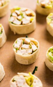 Chicken Caesar Salad Pinwheels make a light and delicious lunch or and super tasty appetizer! They're also an excellent way to use leftover chicken!