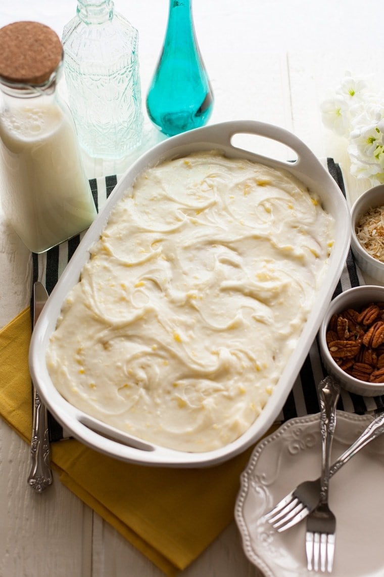 Banana Cake with Pineapple Cream Cheese Frosting. The perfect treat for your summer party!