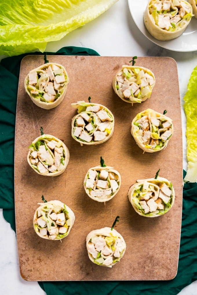 Chicken Caesar Salad Pinwheels make a light and delicious lunch or and super tasty appetizer! They're also an excellent way to use leftover chicken!