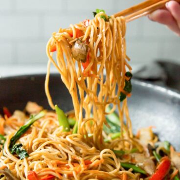 A pan filled with chicken lo mein