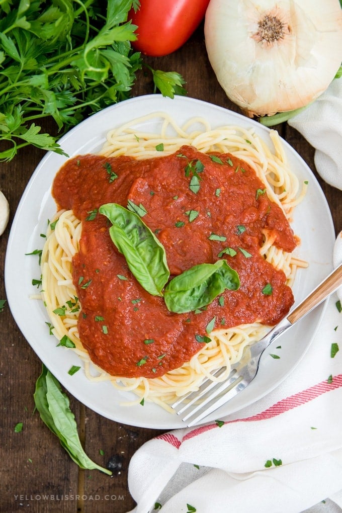 Easy Homemade Spaghetti Sauce over spaghetti on a plate