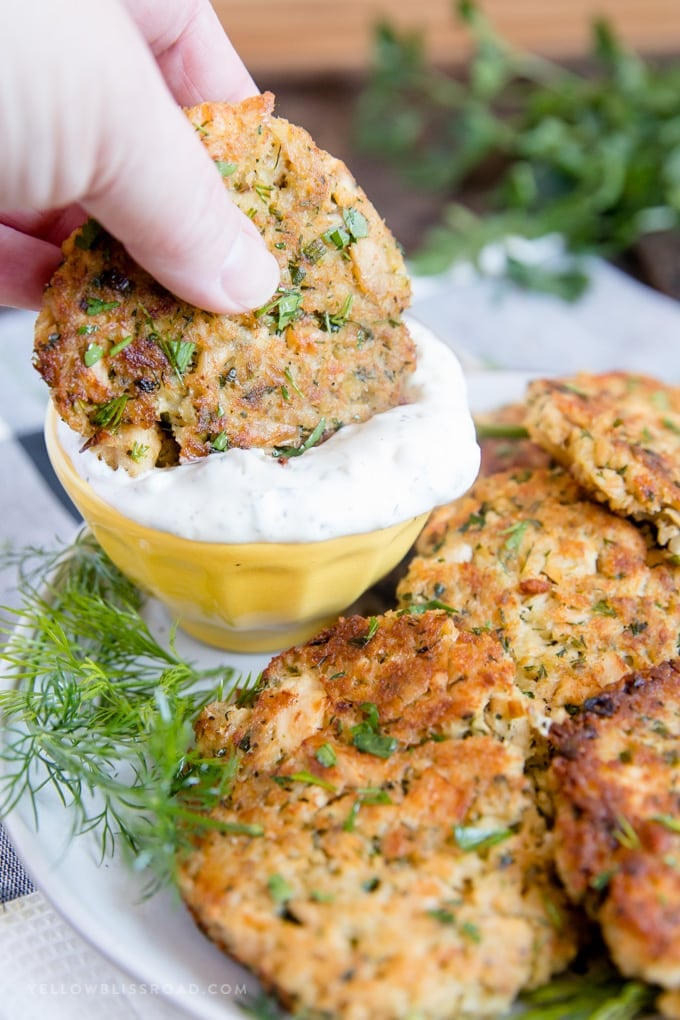 salmon patty dipped in tartar sauce