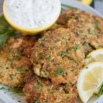 A plate of Salmon Patties with tartar sauce