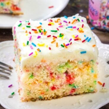 A piece of funfetti cake on a plate