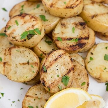 A close up of grilled potatoes.