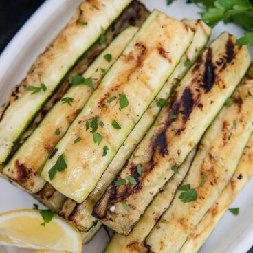 A plate of grilled zucchini slices