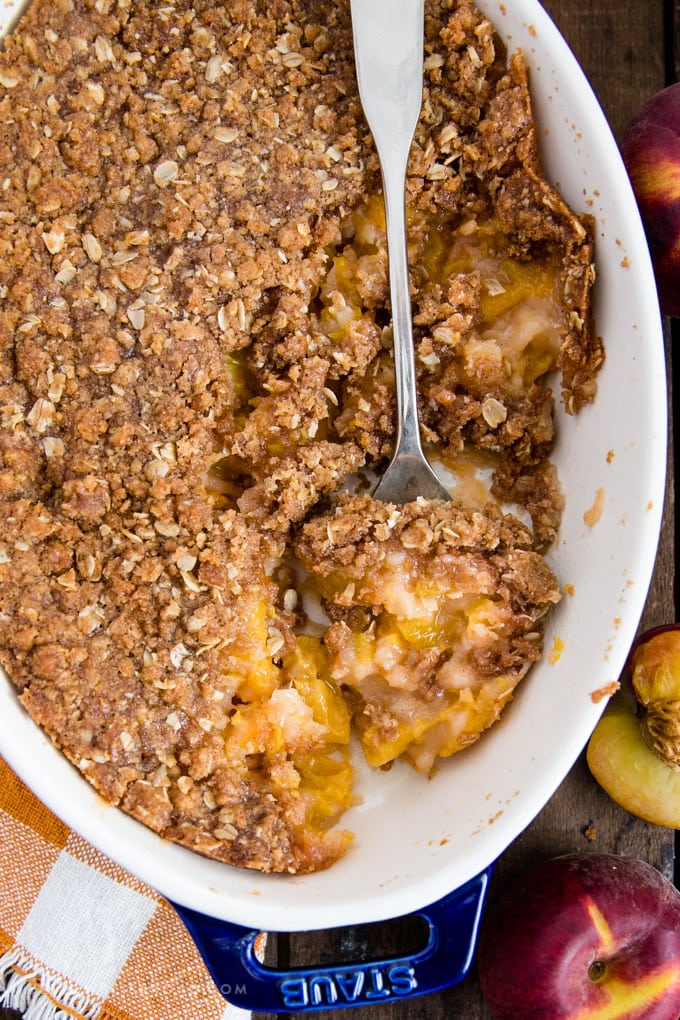 A baking dish with fresh peach crisp