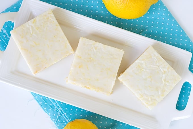 lemon brownies side by side on a serving platter