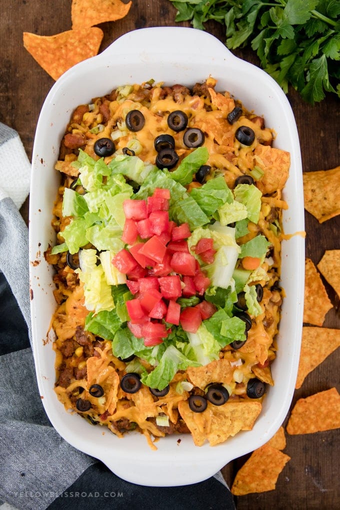 Dorito Taco Salad Casserole in a white baking dish