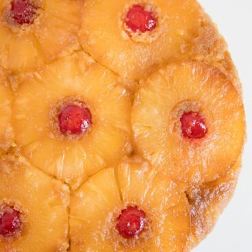 A close up of a pineapple upside down cake