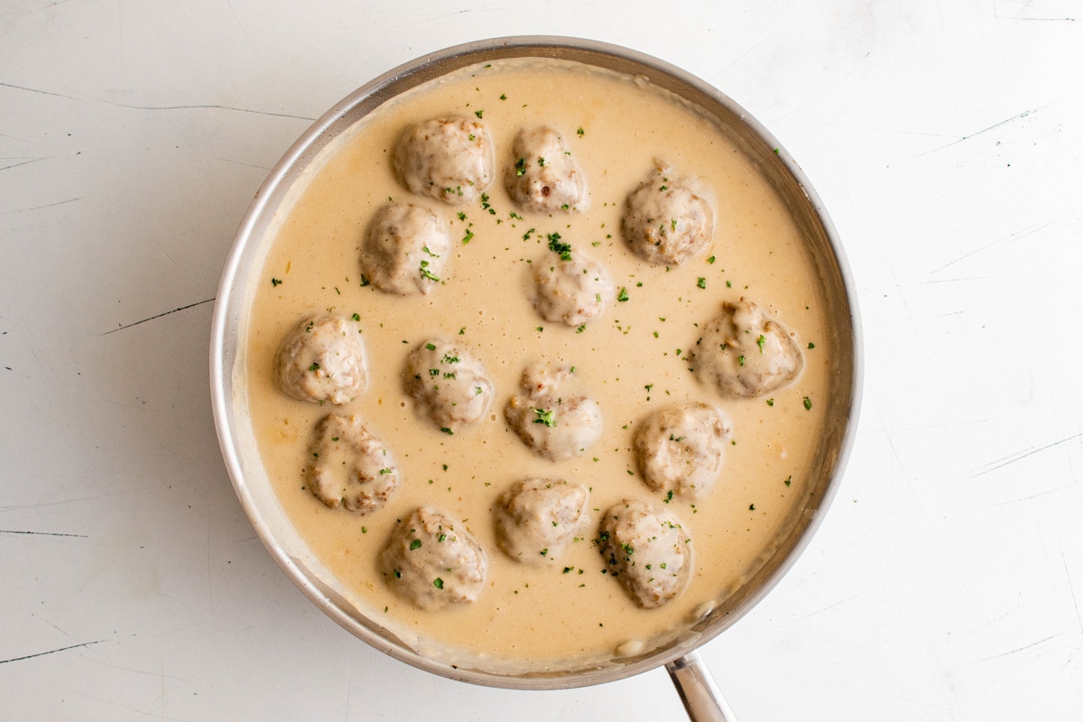Swedish Meatballs in gravy with minced parsley.