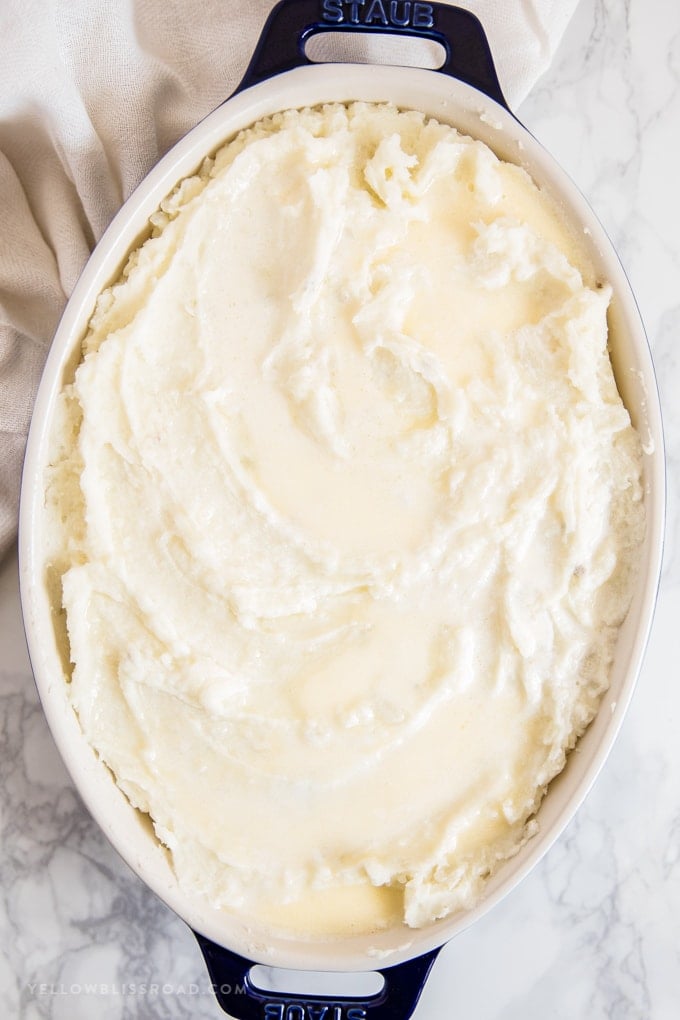 mashed potatoes in a dish prior to baking