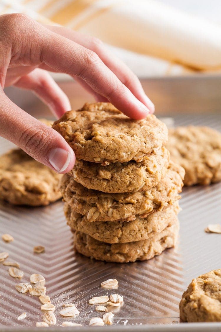 hand reaching for an oatmeal pumpkin cookie