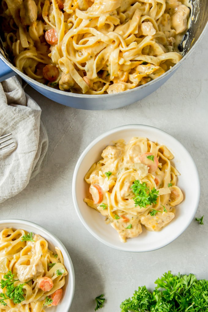 One Pot creamy chicken and noodles served into two white bowls