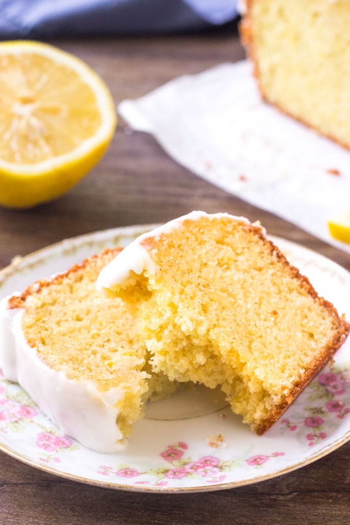A slice of moist Starbucks lemon loaf on a plate.