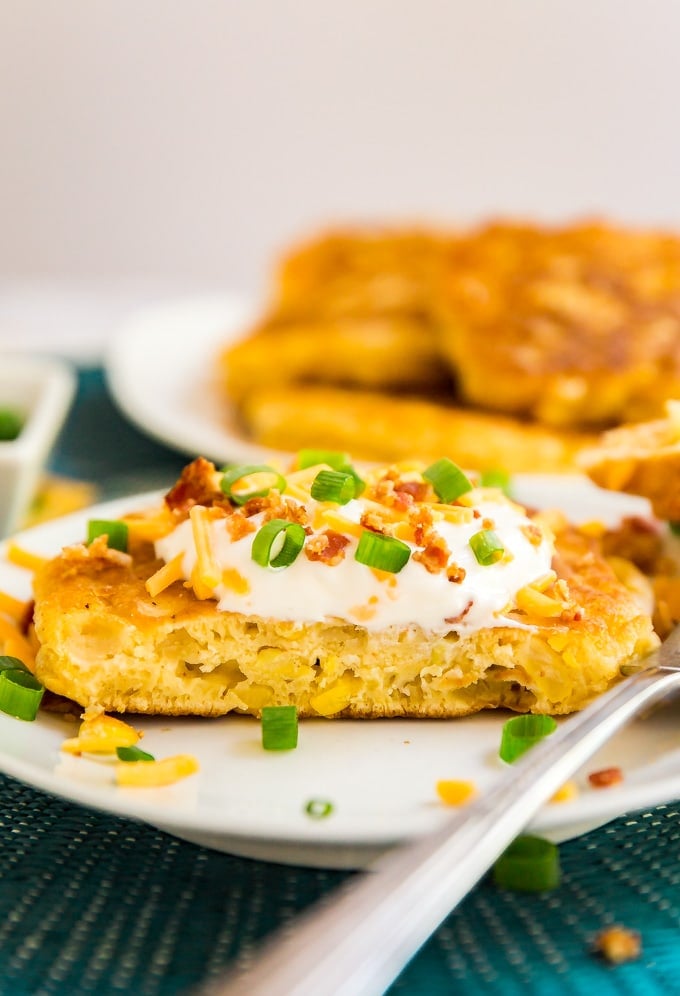 Loaded Corn Fritters are a light and fluffy corn cake topped with all the fixings to make this the a killer game day snack!