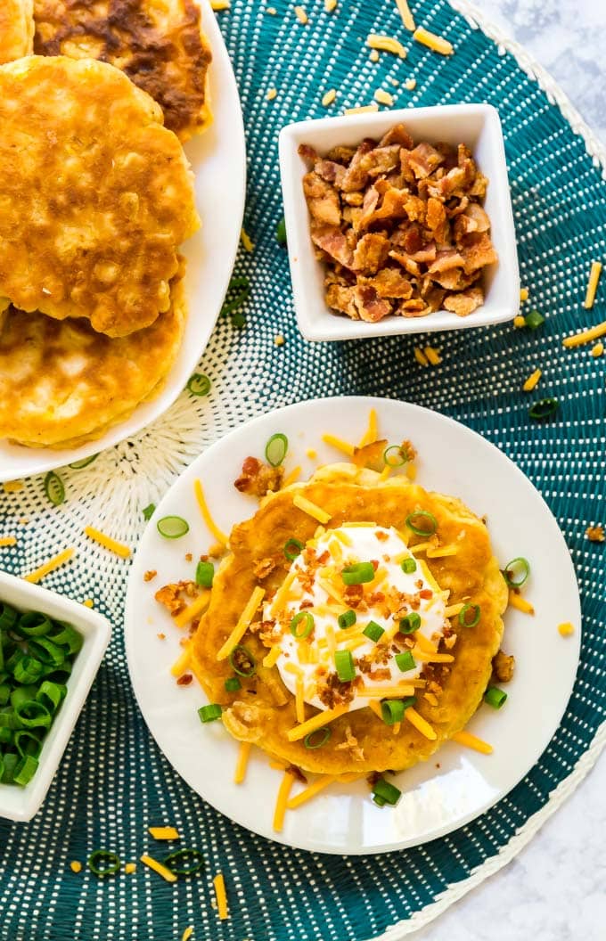 Loaded Corn Fritters are a light and fluffy corn cake topped with all the fixings to make this the a killer game day snack!