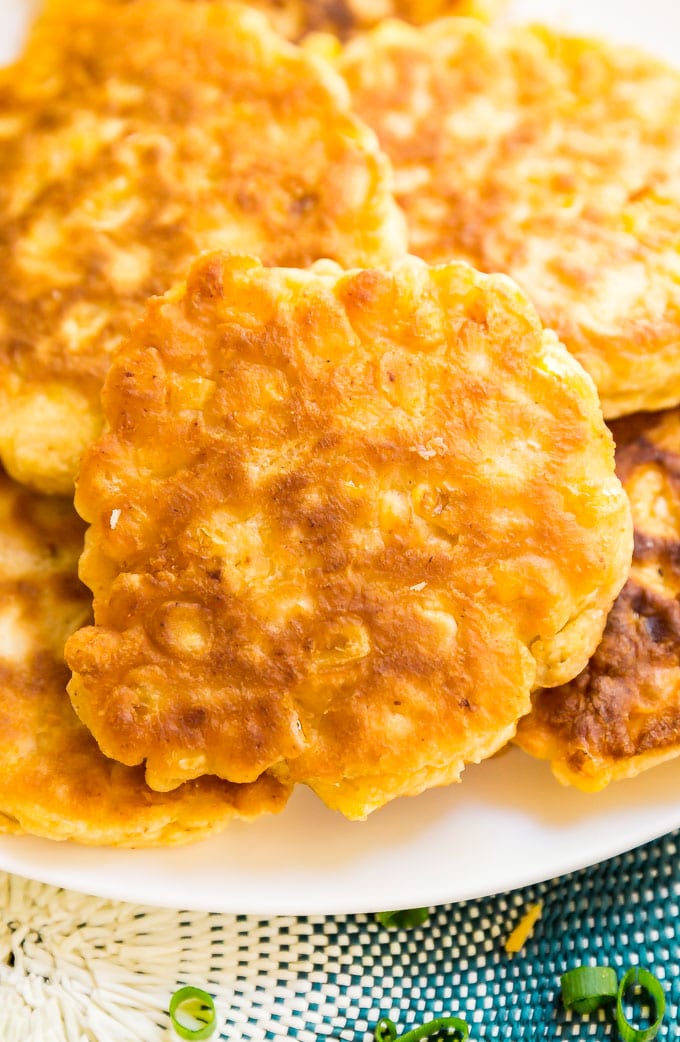 Loaded Corn Fritters are a light and fluffy corn cake topped with all the fixings to make this the a killer game day snack!